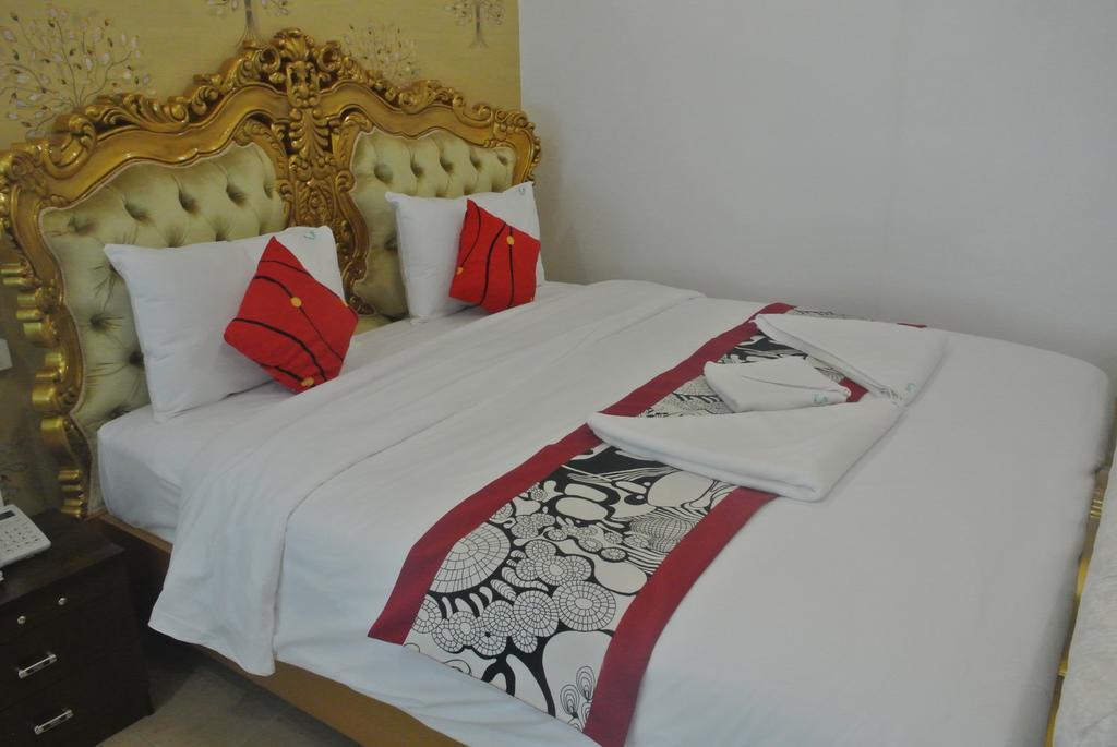 New Usouk Boutique Hotel Vientiane Room photo